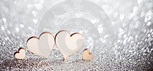 Four hearts on glitters