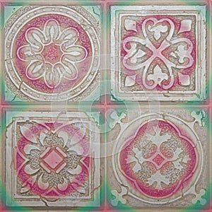 The the four individual tiles each have a different pattern. The tiles are off colourful and useful as background, or border