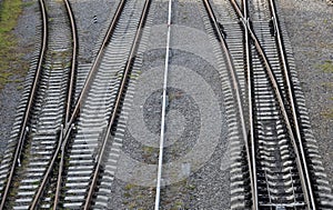 Four intersecting railway lines on gravel