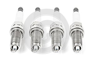 Four iridium spark plugs in a row
