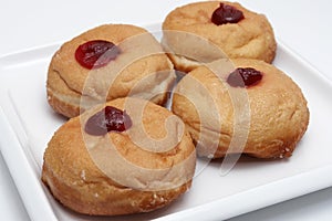 Four jam donuts