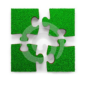 Four jigsaw puzzles with green grass, 3D illustration