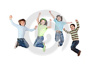 Four joyful children jumping