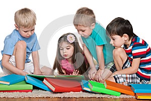 Four kids with books