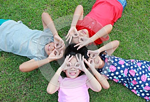 Four kids having fun in the park. photo