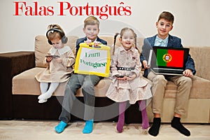 Four kids show inscription learn portuguese. Foreign language learning concept. Falas portugues photo