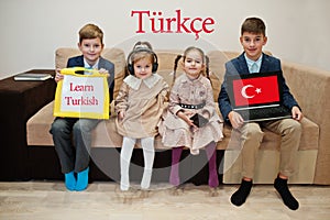 Four kids show inscription learn turkish. Foreign language learning concept. Turkce