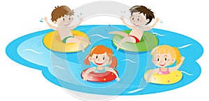 Four kids swimming in pool