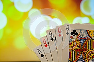 Four of a kind poker cards combination on blurred background casino game fortune luck