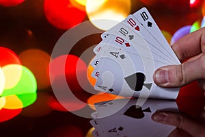 Four of a kind poker cards combination on blurred background casino luck fortune card game