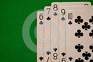 Four of a kind poker cards combination on green background casino game fortune luck