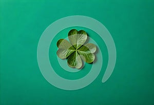 four leaf clover on the center of green background