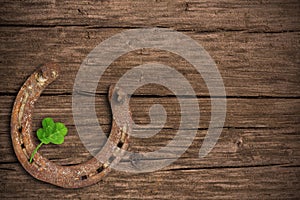 Four-leaved clover and a horse shoe