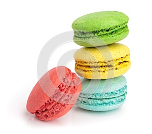 Four macaroons isolated on white background closeup