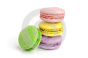 Four macaroons isolated on white background closeup