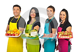 Four market workers with their products photo