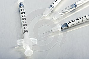Four medical syringes