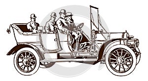 Four men with hats riding an open antique touring car