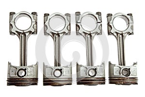 Four Metal Pistons