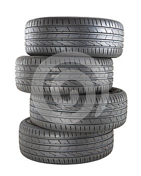 Four new black tyres for car driving isolated on white background