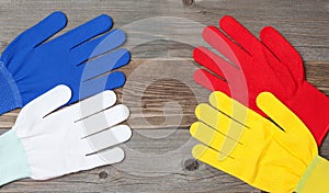 Four new working multicolored gloves
