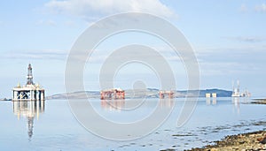 Four oil rigs in the Cromarty Firth. photo