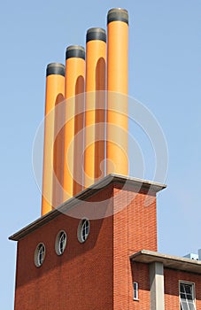 Four orange chimneys