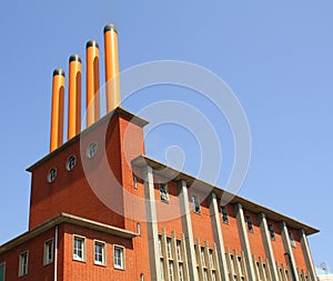 Four orange chimneys