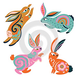 Four Oriental Rabbits with folk ornaments inside photo