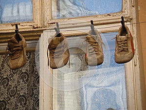 Four pairs of old shoes