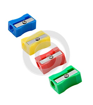 Four pencil sharpener with differents colors