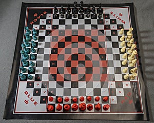 four person chess set all ready for a game