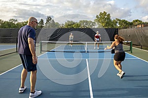 Four Pickleball Players in Action