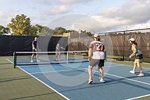 Four Pickleball Players in Action