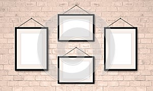 Four Pictures Frames Set Hanging On Vintage Brick Wall. 4 Professional Photos Frame Collection. Two Blank Horizontal and two Foto