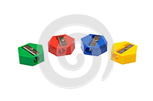 Four pieces of multiple colored pencil sharpeners