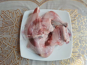 Four Pieces Raw Chicken Meat in a Plate