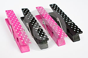 Four Pink and Black Clothes Pins with Fun Patterns Perspective V