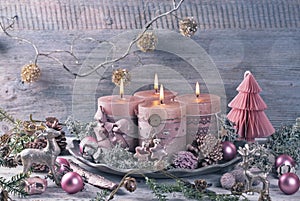 Four pink christmas candle