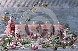 Four pink christmas candle