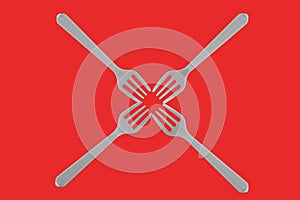 Four plastic white forks on a red background. isolate. Top view