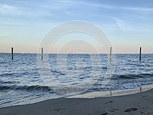 Four Poles In Bay - Beach View