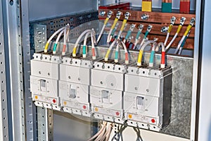 Four power circuit breakers are fixed in the electrical Cabinet in line