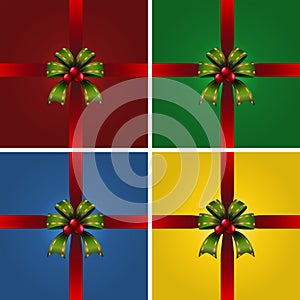 Four present boxes with green ribbons