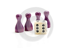 Four purple wooden pawns with dice