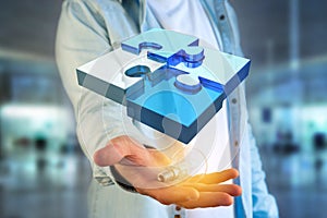 Four puzzle pieces making a logo on a futuristic interface - 3d