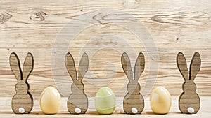Four rabbits three eggs