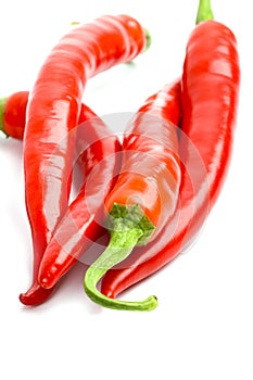 Four red chilly peppers