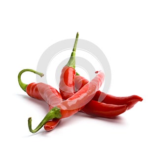 Four red chilly peppers