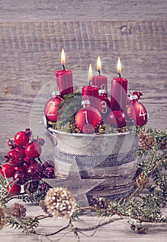 Four red christmas candle